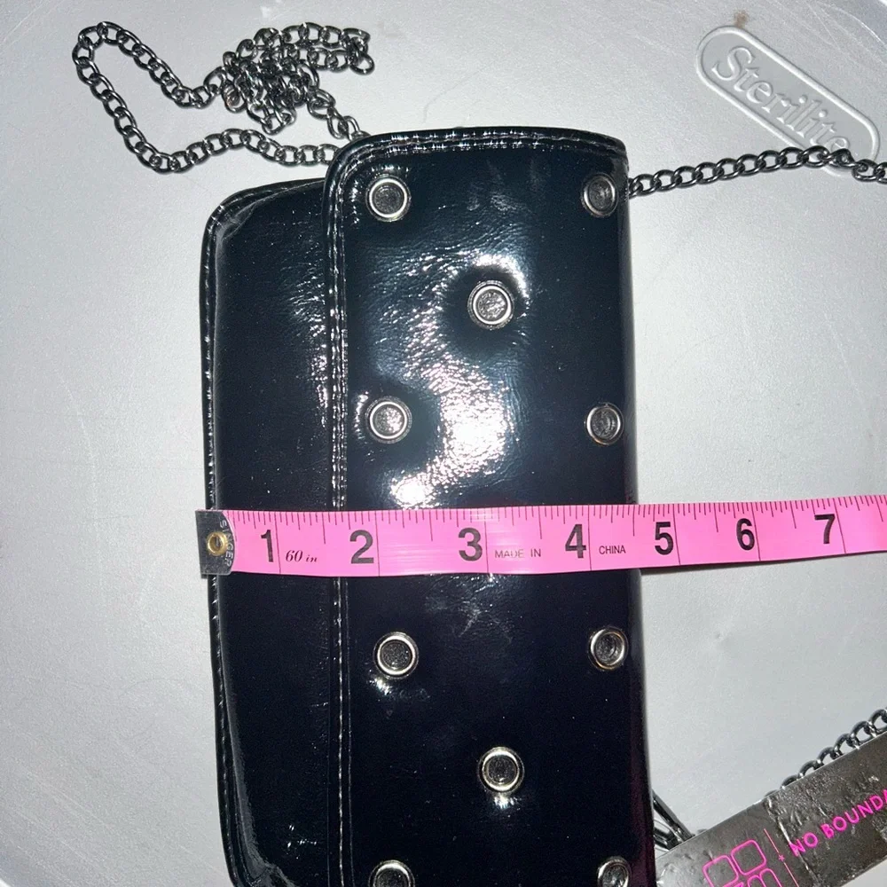 No Boundaries Shiny Black Crossbody Bag with Eyelets